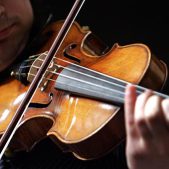 Violinist Adrian Pintea, from The Julliard School, plays a 1729 Stradivari known as the "Solomon, Ex-Lambert" in 2007 at Christie's in New York